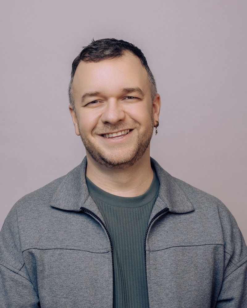 Nick May, smiling